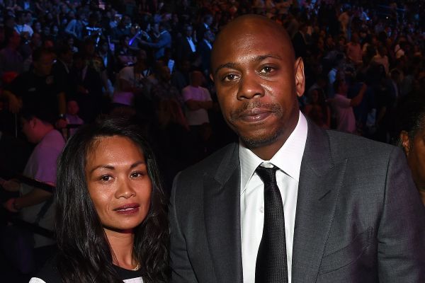 Dave Chappelle with his wife